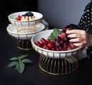 TREND HOME BOWL Assiette de service en porcelaine avec support doré en métal 26 cm